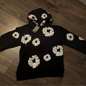 Denim Tear Hoodie colour black with White Floral Pattern
